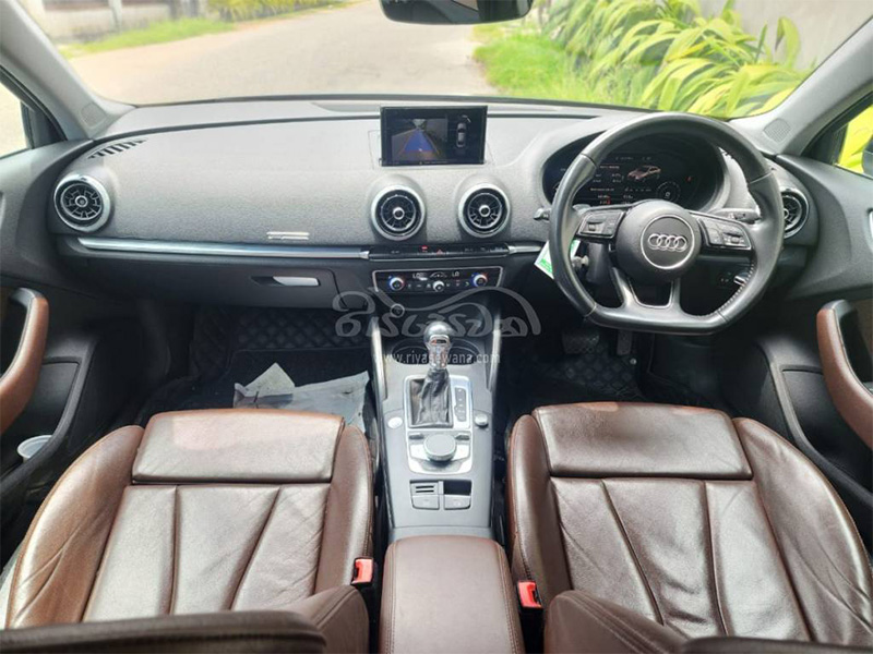 The front-interior view of the Audi A3 (2018) Sedan Vehicle