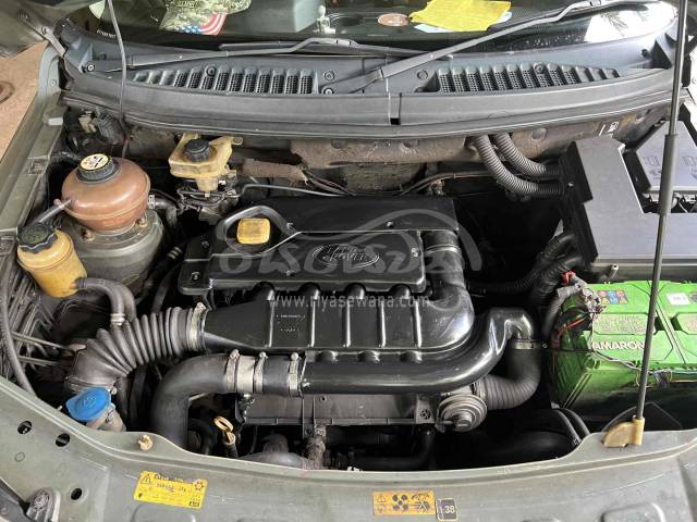 The engine compartment view of the Land Rover Freelander 2006 SUV with a 1951CC inline 4-cylinder engine.