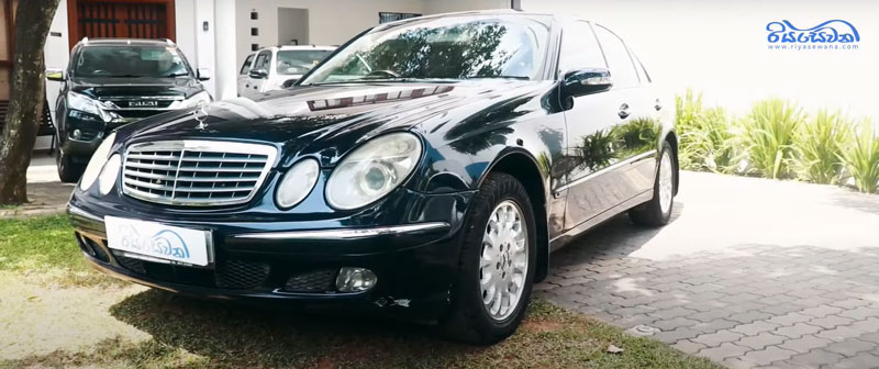 The front-exterior view of a Benz E240