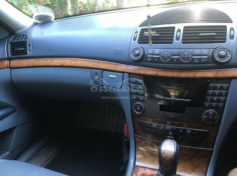 The front-interior view of a Benz E240