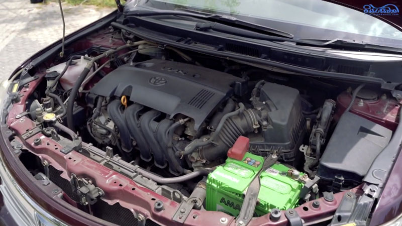 The engine compartment of the 2014 Toyota Allion 260 car with a 1.5-liter inline four-cylinder naturally aspirated petrol engine.