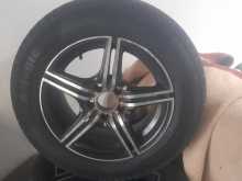 14" Alloy wheels with tyers
