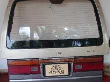 Caravan door and brake booster