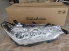 Japan Original Brand New Head Lights - Toyota Axio Hybrid (12-595)