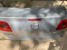 Mazda axela dicky door