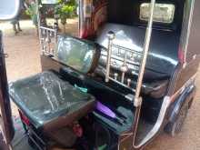 https://riyasewana.com/uploads/bajaj-re205-2013-1813184012823.jpg
