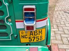 https://riyasewana.com/uploads/bajaj-re205-221652266236.jpg