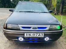 https://riyasewana.com/uploads/ford-ford-laser-1991-1521314412212.jpg