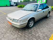 Ford LASER 1990 Car