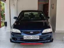 https://riyasewana.com/uploads/ford-laser-1998-159474512632.jpg