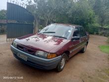 https://riyasewana.com/uploads/ford-laser-2112460017192.jpg