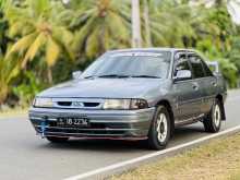 https://riyasewana.com/uploads/ford-laser-2620583622473.jpg