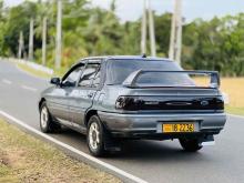 https://riyasewana.com/uploads/ford-laser-2620591424471.jpg