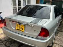 https://riyasewana.com/uploads/ford-laser-27152540192.jpg