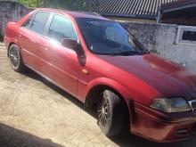 https://riyasewana.com/uploads/ford-laser-292303056446.jpg