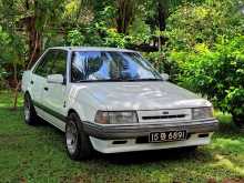 Ford Laser BF Ghia 1987 Car