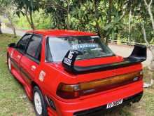 https://riyasewana.com/uploads/ford-laser-ghia-1114385022562.jpg