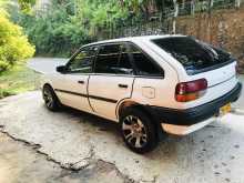 https://riyasewana.com/uploads/ford-mazda-familia-515533922442.jpg