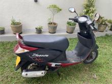 https://riyasewana.com/uploads/hero-honda-pleasure-712424019775.jpg