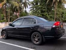 https://riyasewana.com/uploads/honda-civic-es-2003-2015324312884.jpg