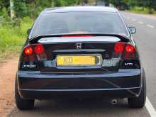 https://riyasewana.com/uploads/honda-civic-es5-2003-1921194212264.jpg