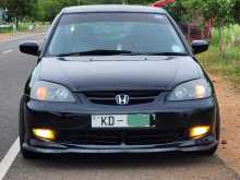 https://riyasewana.com/uploads/honda-civic-es5-2003-1921194212963.jpg