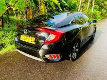https://riyasewana.com/uploads/honda-civic-ex-2110464224802.jpg