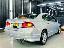 https://riyasewana.com/uploads/honda-civic-hybrid-2011-69304012882.jpg