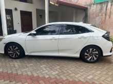https://riyasewana.com/uploads/honda-civic-sr-2018-2521261312434.jpg