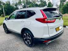 https://riyasewana.com/uploads/honda-cr-v-vti-l-2018-229341212733.jpg