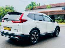 https://riyasewana.com/uploads/honda-crv-2712212322083.jpg