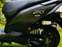 https://riyasewana.com/uploads/honda-dio-dx-141007071593.jpg