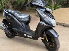 https://riyasewana.com/uploads/honda-dio-dx-1615122024312.jpg