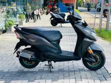 https://riyasewana.com/uploads/honda-dio-dx-18937331903.jpg