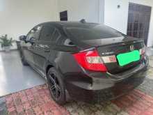 https://riyasewana.com/uploads/honda-fb1-civic-2012-2018164412643.jpg