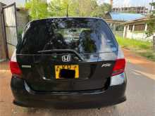 https://riyasewana.com/uploads/honda-fit-gd1-2011-2322415112572.jpg