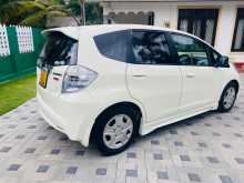 https://riyasewana.com/uploads/honda-fit-gp1-2013-2121031912672.jpg