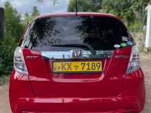 https://riyasewana.com/uploads/honda-fit-hybrid-2013-2917024712423.jpg