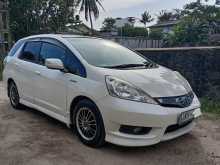 https://riyasewana.com/uploads/honda-fit-shuttle-2013-167431612843.jpg