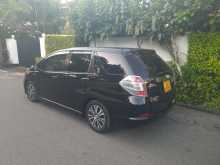 https://riyasewana.com/uploads/honda-fit-shuttle-2014-620391312913.jpg