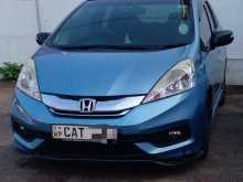 https://riyasewana.com/uploads/honda-fit-shuttle-301655434212.jpg