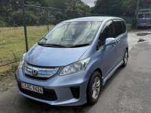 https://riyasewana.com/uploads/honda-freed-gp3-219212122891.jpg