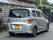 https://riyasewana.com/uploads/honda-freed-silver-10174318742.jpg