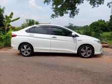 https://riyasewana.com/uploads/honda-grace-16937124353.jpg