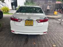 https://riyasewana.com/uploads/honda-grace-2016-1515515212982.jpg