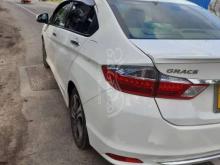 https://riyasewana.com/uploads/honda-grace-4150110601460.jpg