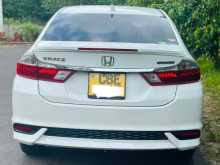 https://riyasewana.com/uploads/honda-grace-rs-2018-3011503912764.jpg