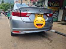https://riyasewana.com/uploads/honda-honda-grace-2016-239340112912.jpg