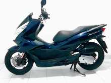 https://riyasewana.com/uploads/honda-pcx-150-1218340213654.jpg