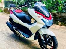 https://riyasewana.com/uploads/honda-pcx-150-1514190013032.jpg